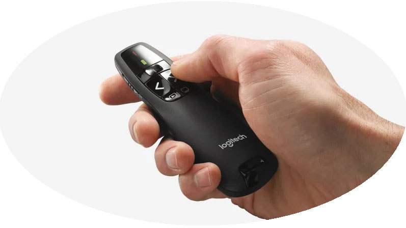 Logitech R400 laser remote control in hand. Logitech R400 laser remote control in hand.