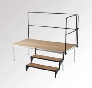 Kleu plug-in staircase. Small pedestal from Kleu with two-step staircase and black railing.
